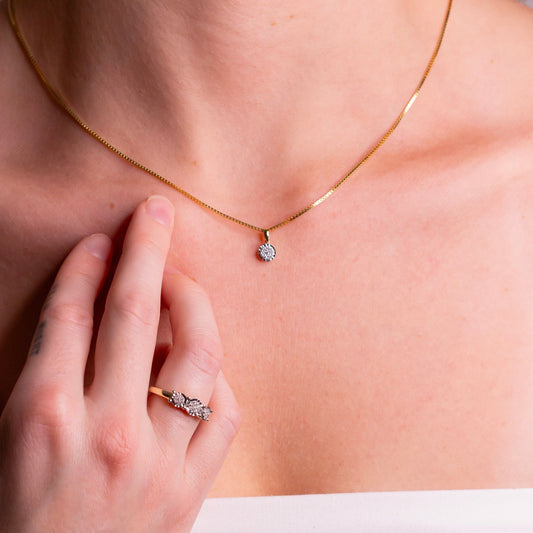Halssmykke i Gult/Hvitt Gull (585) med 0.10ct TW/SI Diamanter